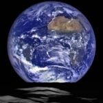 A photo of Earth taken by a NASA spacecraft in orbit around the moon